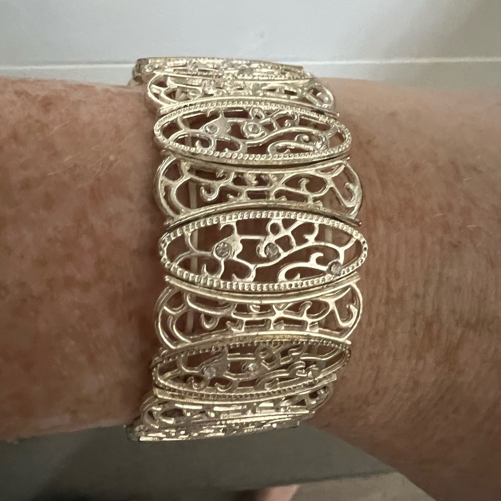 2/$14 Silver filigree bracelet.